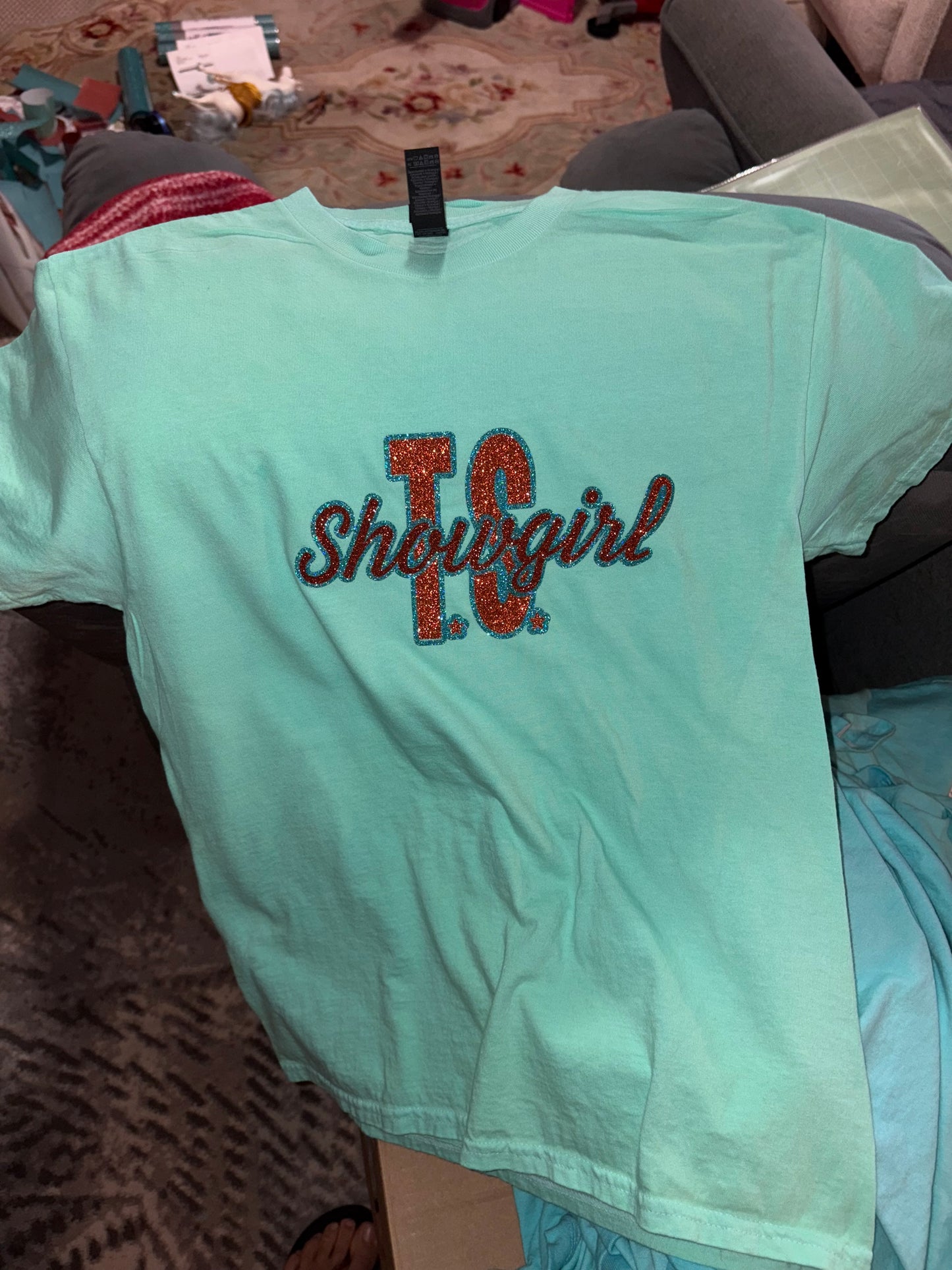 Teal and orange shirts