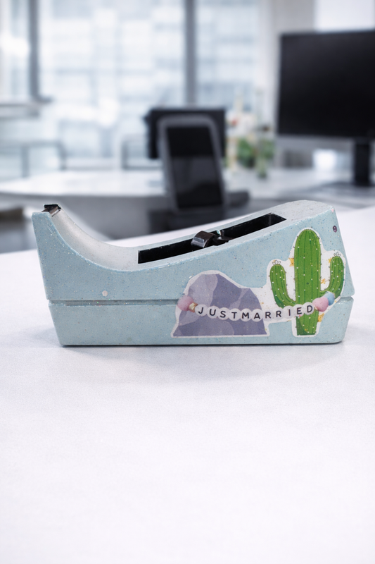 Rock and cactus tape dispenser