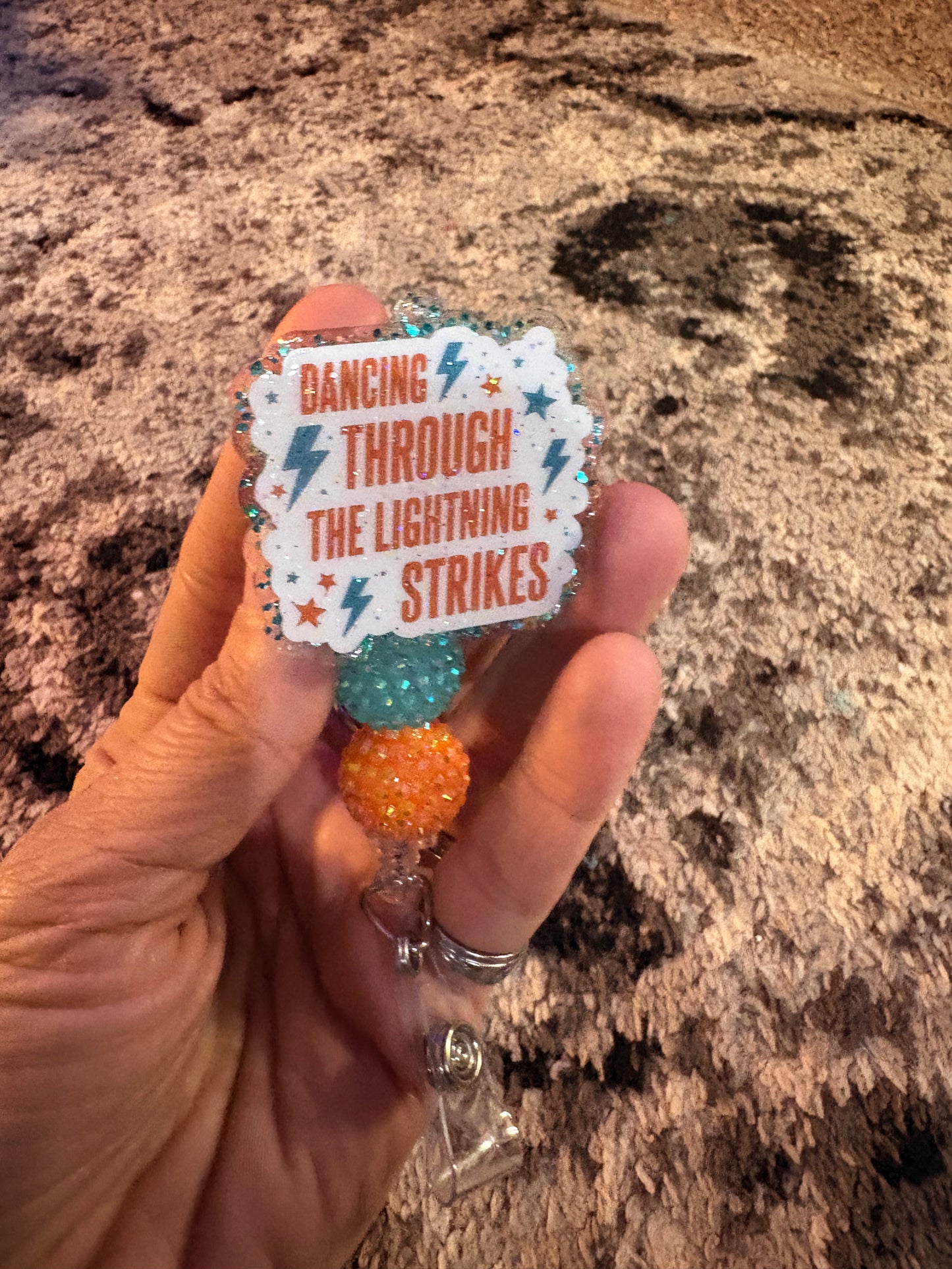 Lightning strikes badge reel