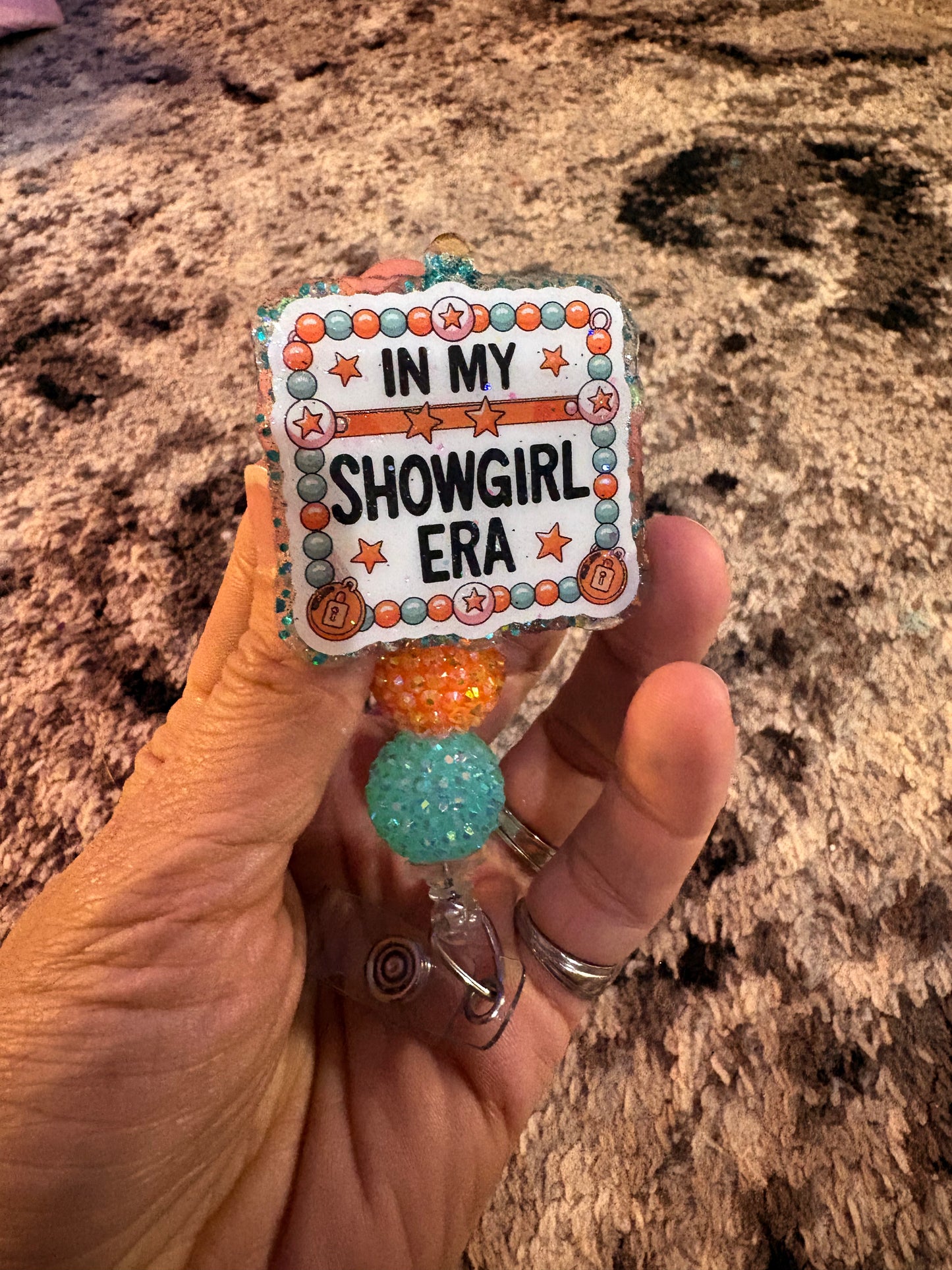 Showgirl era badge reel