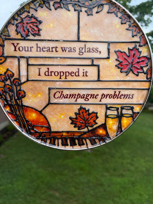 Champagne problems suncatcher